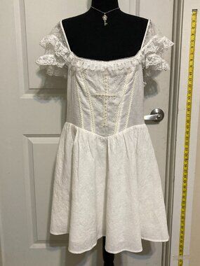 Dolls Kill Dark in Love Angelic White Cross Mini Dress